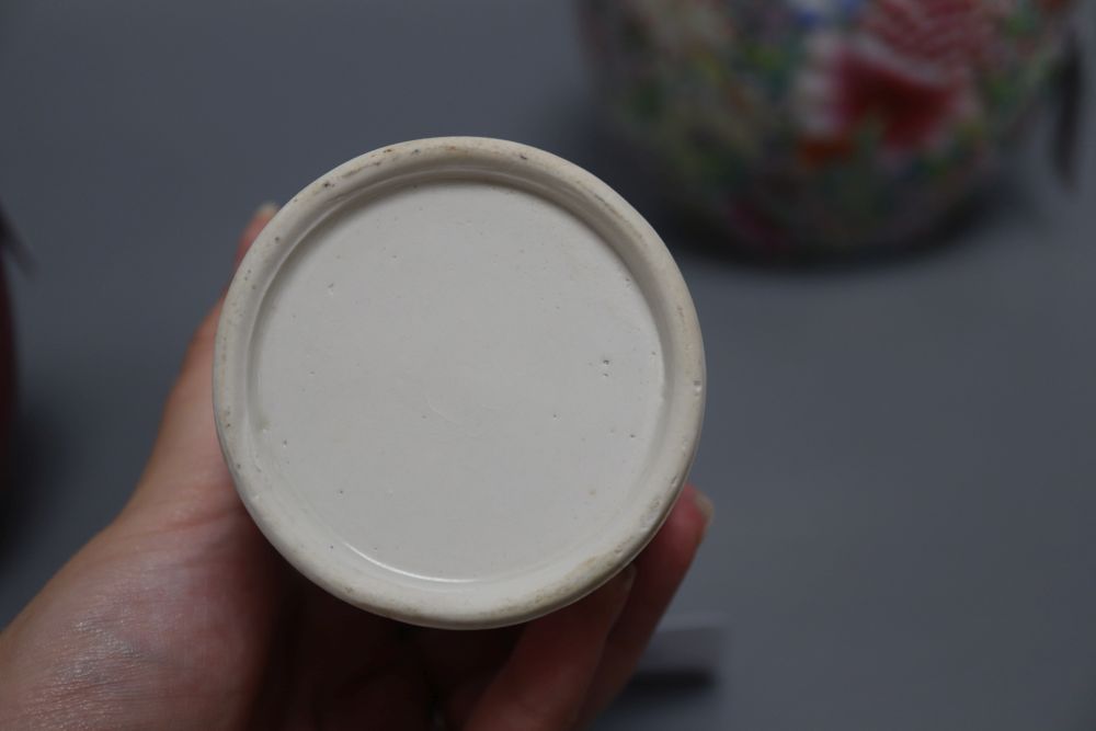 A Chinese millefiore ginger jar and cover, a small blue and white brush pot and an ovoid jar and cover